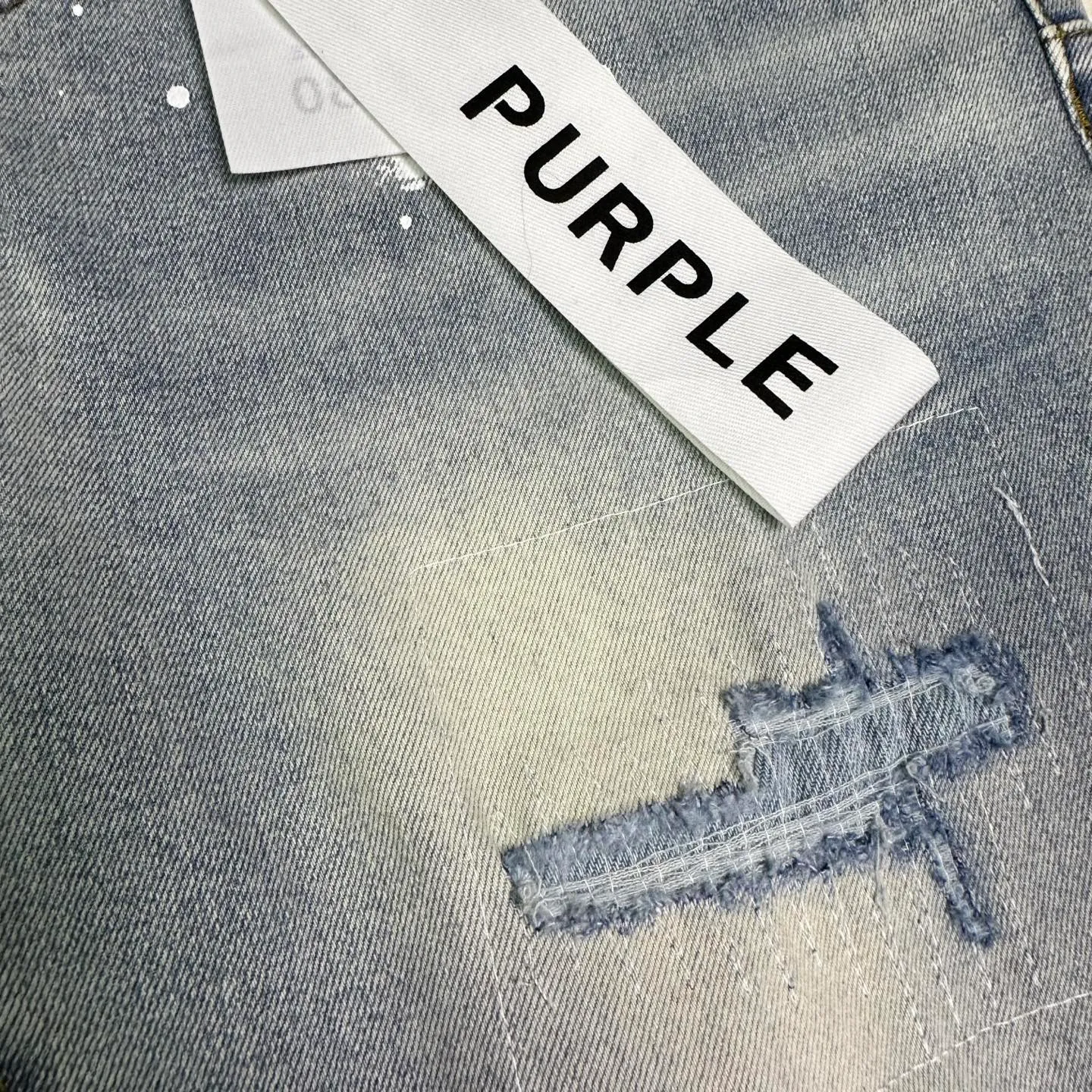 PURPLE BRAND 2026New Arrival Light Blue splash-ink hand-painted ripped and spliced ​​couple style bootcut loose jeans High version High version Top ceiling Quality Styles with different wash textures, very friendly to people with thin legs and thick legs. The bootcut and loose version is very flattering to the leg shape. Moderate length that never goes out of style, easy to match with casually, basic styling for various styles, a must-have in the wardrobe! The fabric is stiff but also makes the upper body soft without losing texture. The washing process is even more perfect. It is a must-have item for everyone! ! ! Washed wheat, hang tag, pants label, three labels complete Color: Light Blue Size: 28, 30, 32, 34, 36 (five sizes)